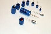 Blue socket tool set with several interchangeable silver sockets on a white background