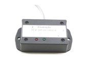 Small gray electronic device with a metal plate and three colored buttons on a white background