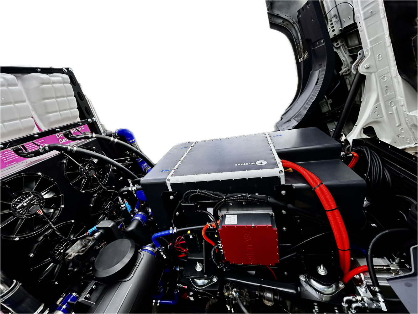 Interior of a spacecraft or aircraft cockpit with exposed wiring, panels, and a red strap under maintenance