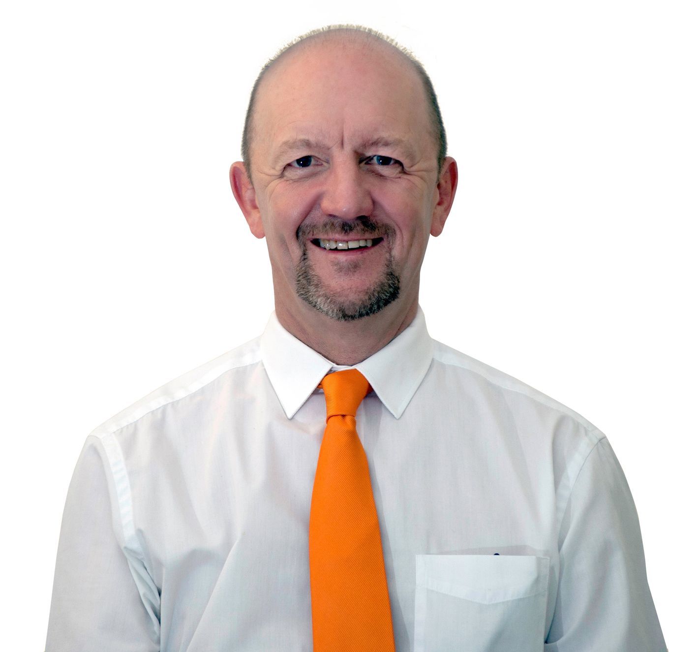 Smiling bald man in a white shirt and bright orange tie on a plain white background