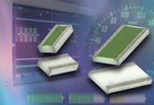 Stacked white and green microchips on a purple digital background