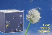 Blue dandelion seedhead next to a device, labeled “1 kW 1900 N 125mm,” on a blue background