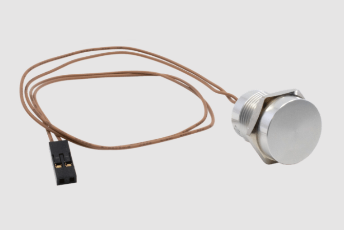Silver metal push button with brown wire and black connector cable