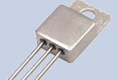 Silver metal TO-3 transistor with three leads on a light background