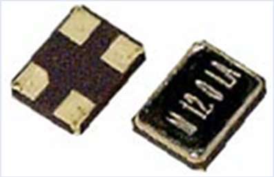 Two small black electronic components with gold contact pads, shown on a white background