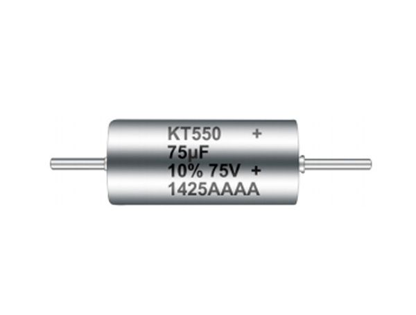 Silver cylindrical capacitor with leads, labeled KT550 75uF 10% 75V