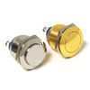Two metallic push buttons, one silver and one gold, on a white background