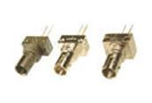 Three small metal electrical connectors with pins, shown side by side on a white background
