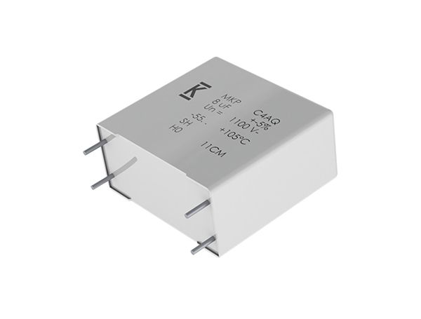 White electronic relay module with metal terminals on a plain background