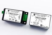 Two small black-and-white electronic modules with green screw terminals on a white background