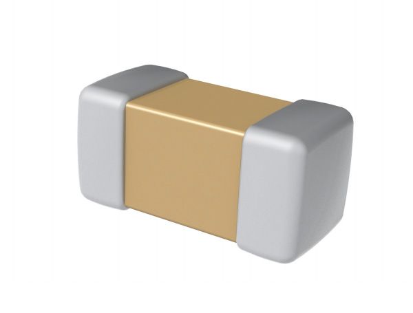 Gold rectangular electronic component with silver ends on a white background