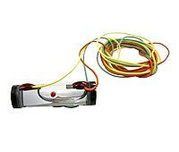 Small flashlight with a red button and a long bundle of colorful wires coiled beside it