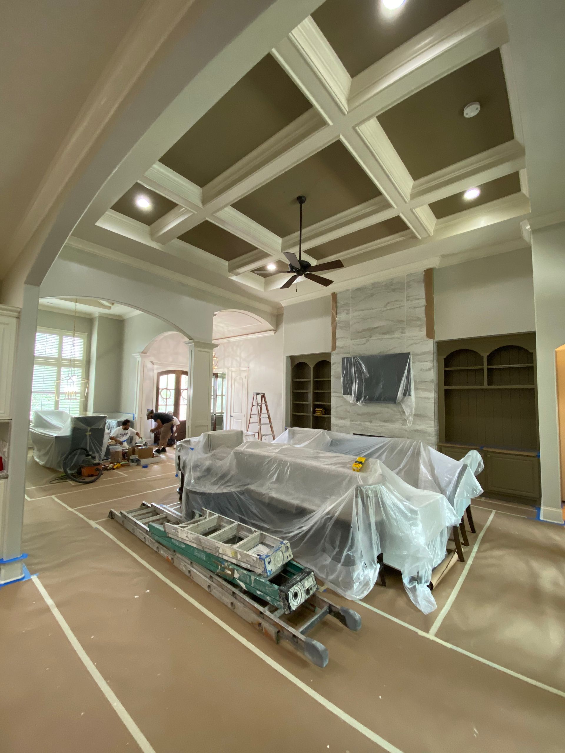 a kitchen with a large island in the middle of the room .