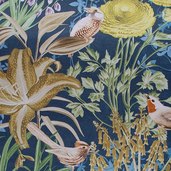 a blue background with birds and flowers on it