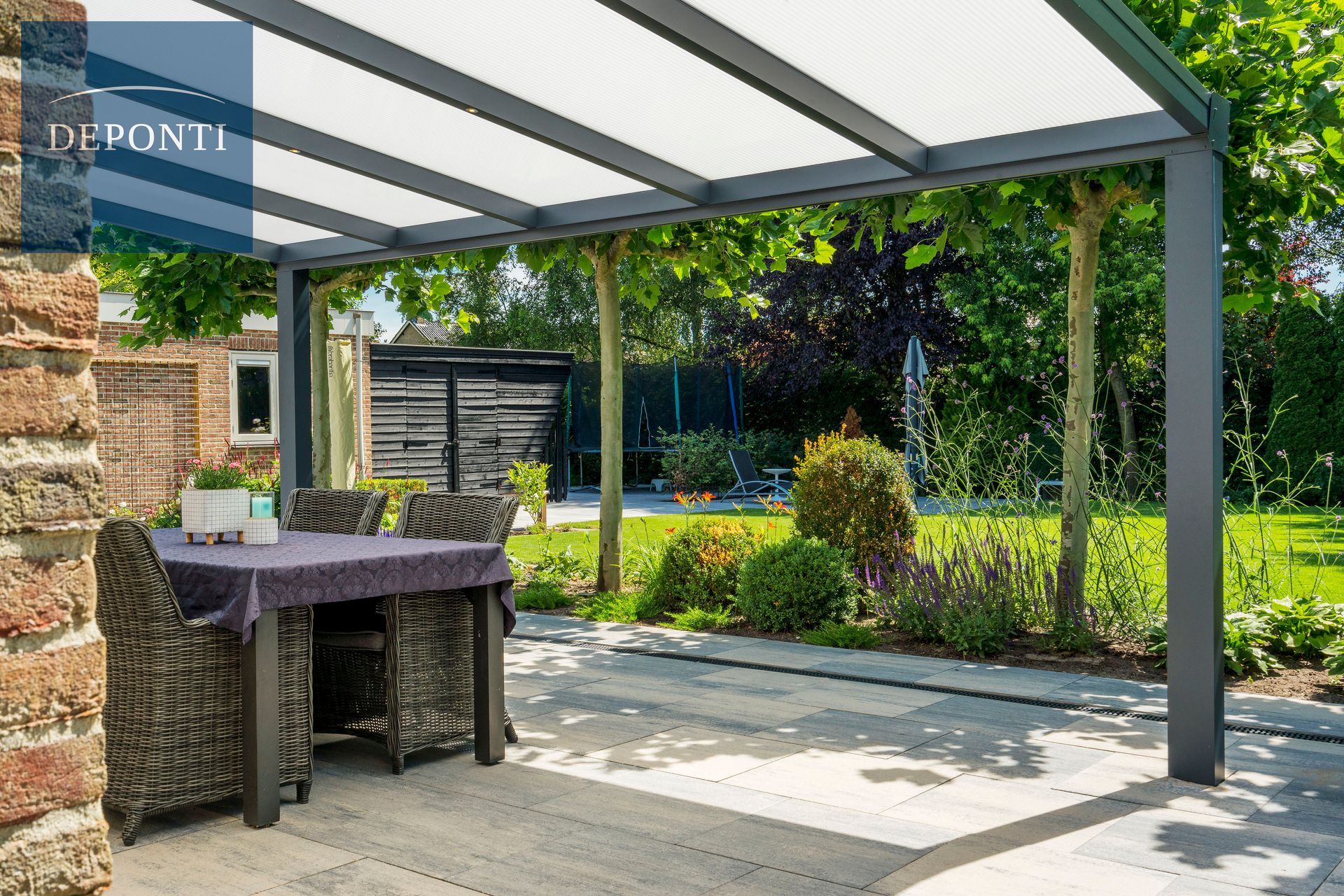 Deponti aluminium veranda  and a table and chairs under the canopy