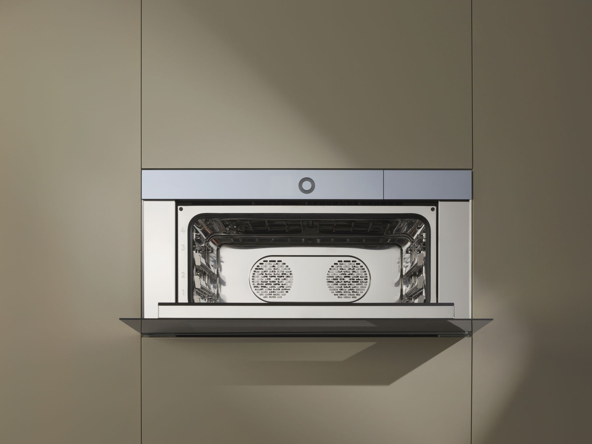 V-ZUG 90cm cooker unit with door open fully in luxury kitchen