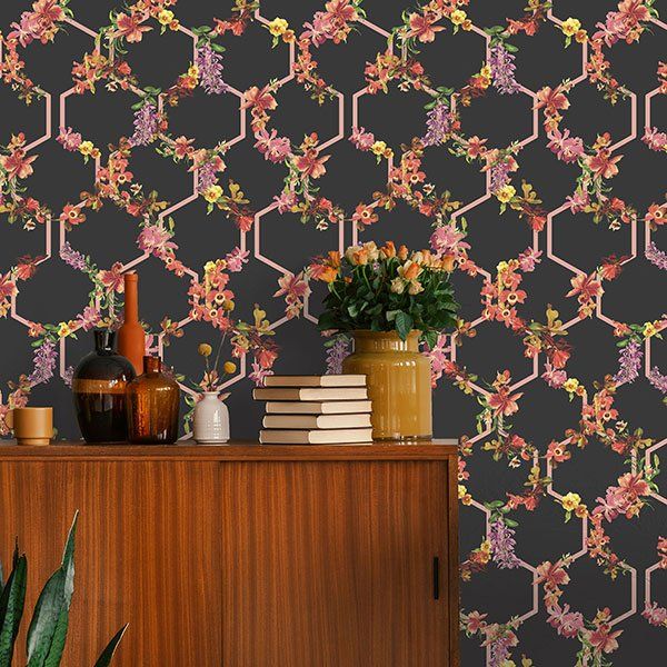 a room with a floral pattern on the wall