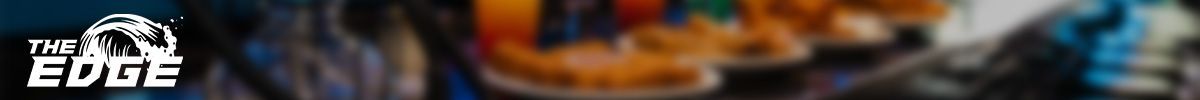 A blurry picture of a person 's face with a colorful background.