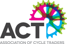 The logo for the association of cycle traders