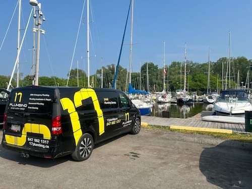 17 Plumbing service van parked near Bronte Harbour in Oakville, providing 24/7 emergency plumbing services across Oakville and the GTA.
