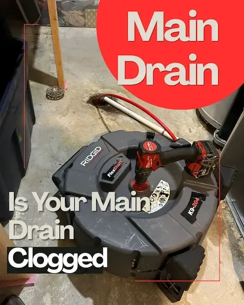 Emergency plumber Oakville clearing main drain backup with professional drain machine