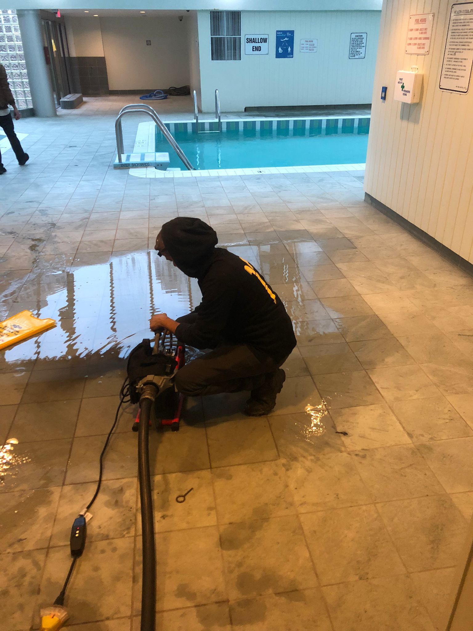 Basement drain backup in Oakville home requiring emergency sewer cleaning service