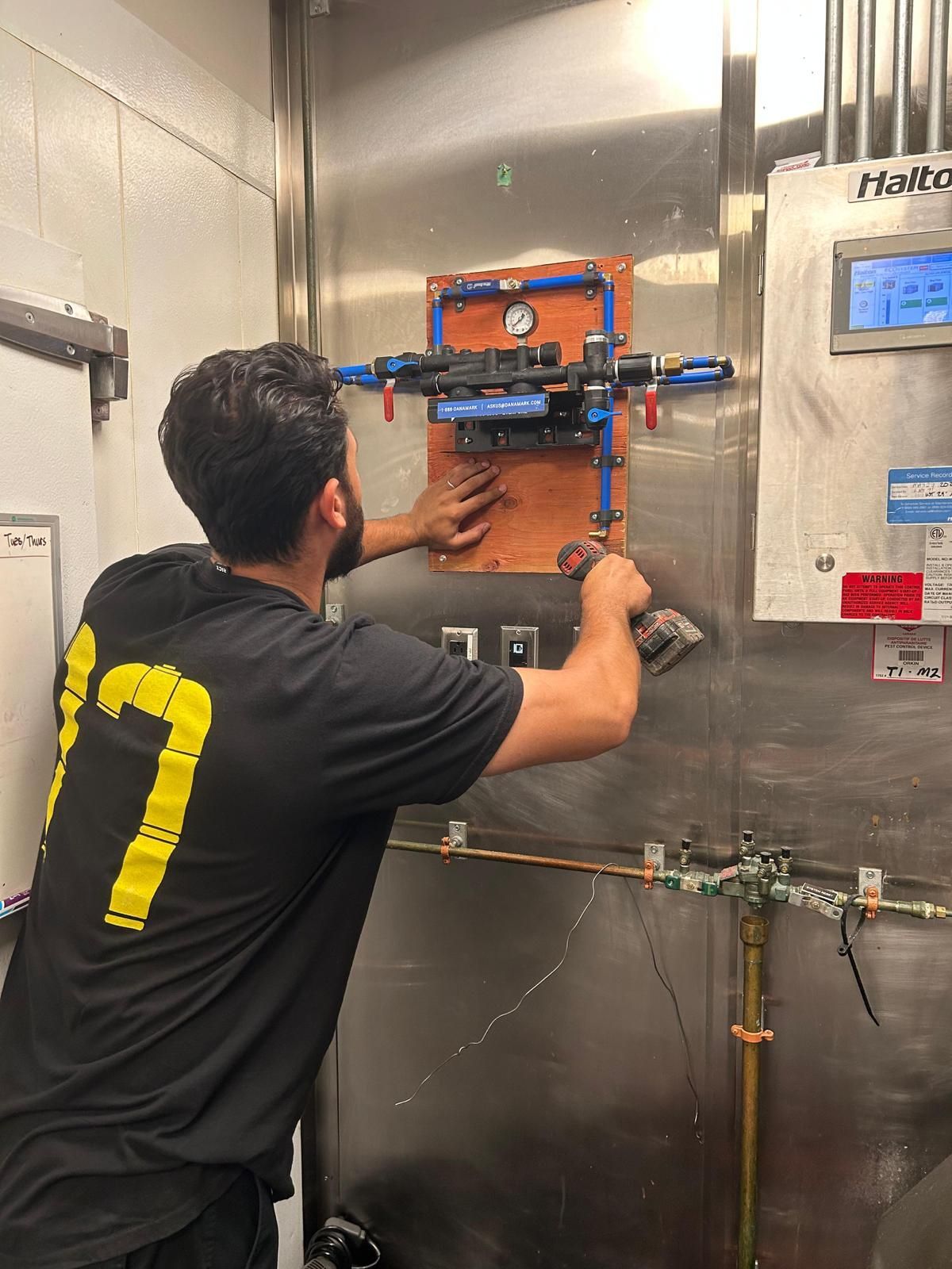 Commercial plumbing system installation and maintenance in Oakville mechanical room