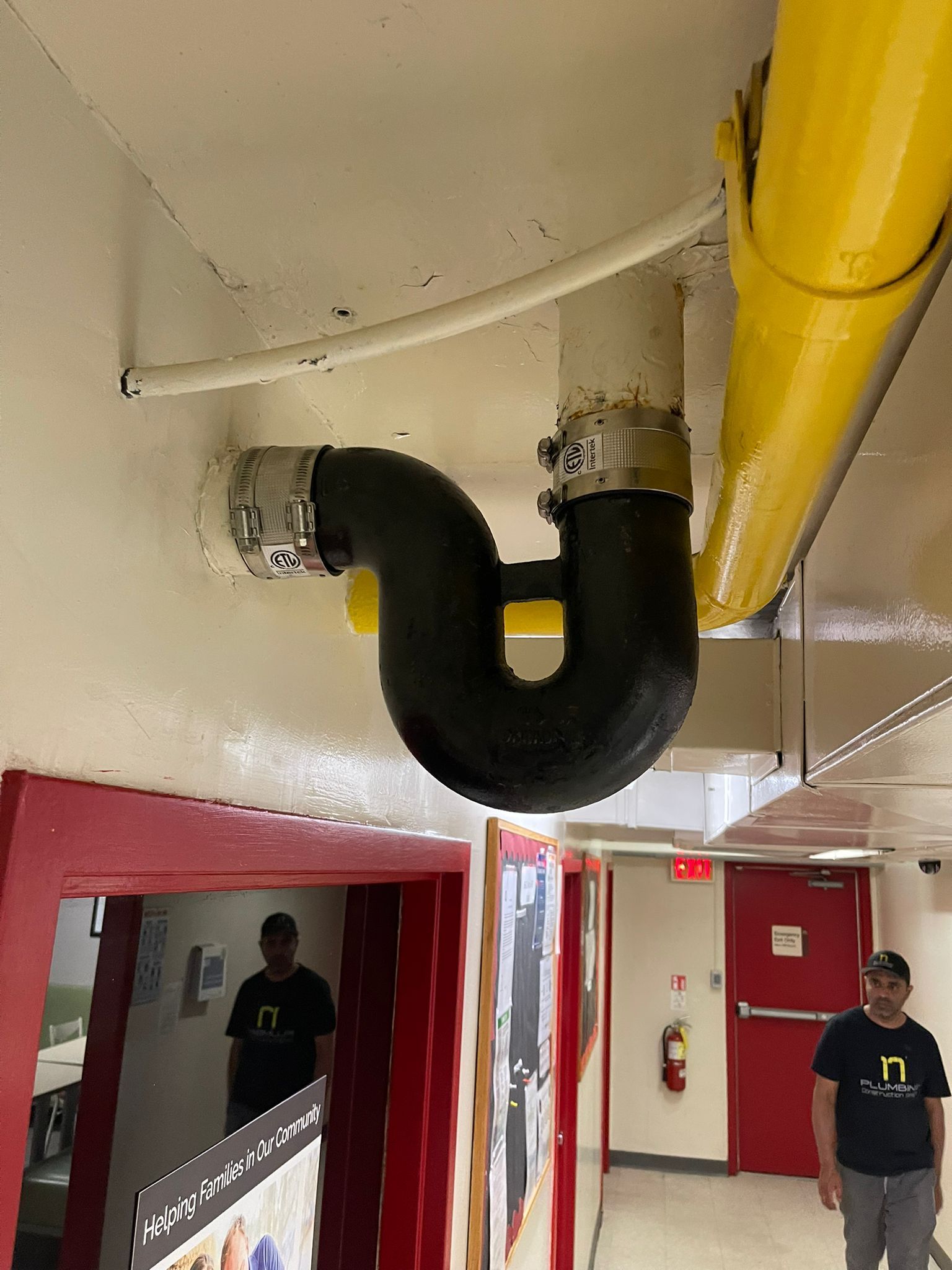 Cast iron drain pipe repair in Oakville commercial property replacing leaking P trap