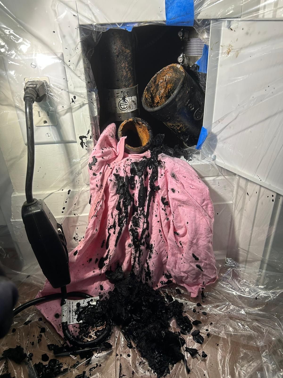 Drain full with black grease in kitchen drain pipe
