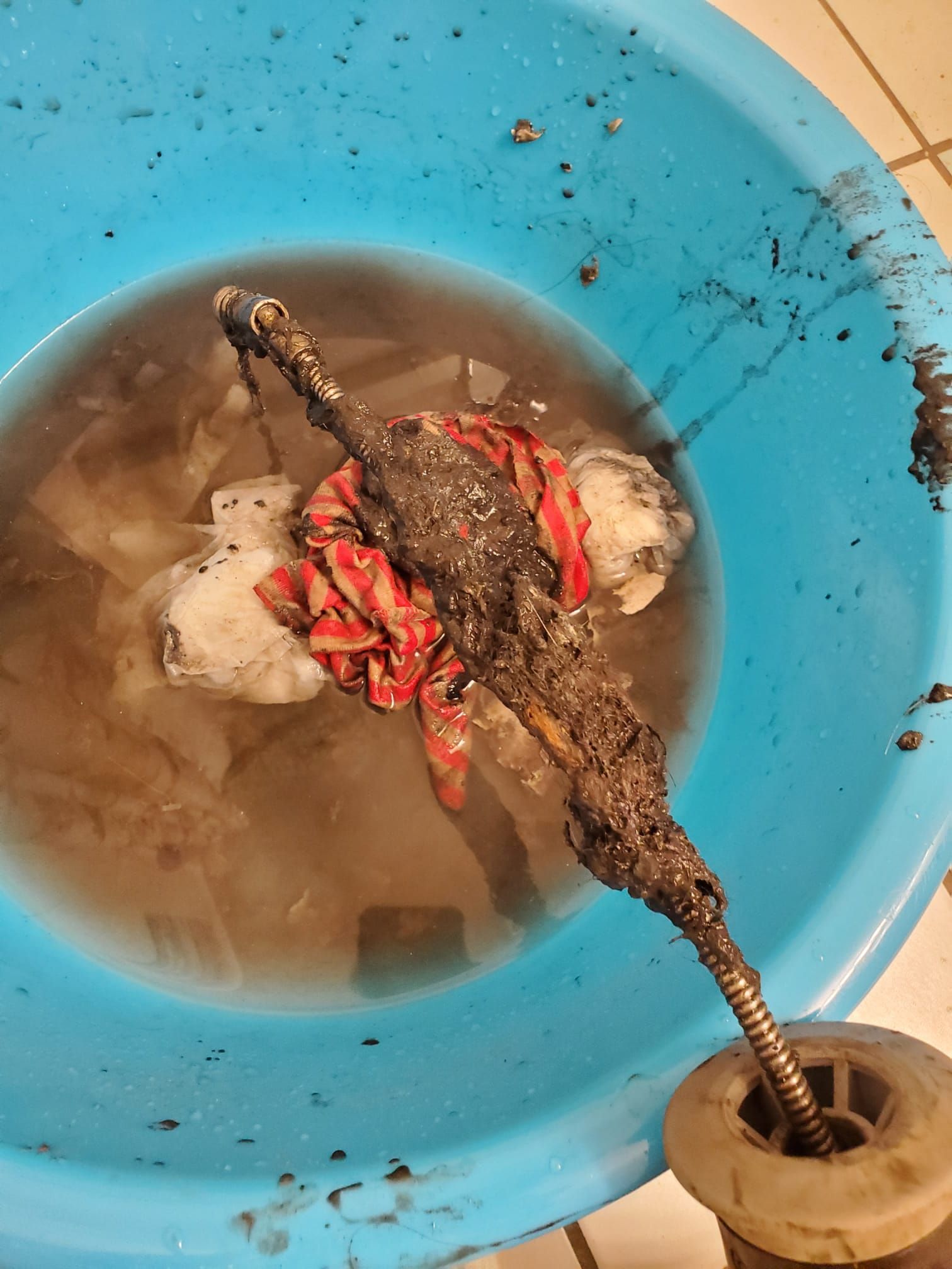 unclogging drain