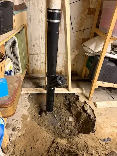 New drain pipe installed in basement after emergency plumber oakville repaired broken sewer line and resolved sewage backup issue