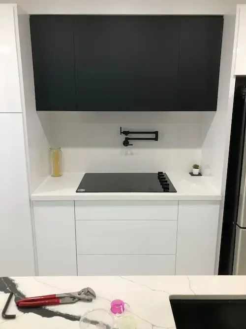 Pot filler faucet installation above kitchen stove by 17 Plumbing in Oakville hom