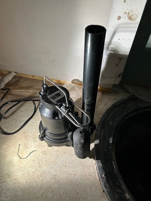 Sump pump repair and installation in Oakville basement to prevent flooding and water damage