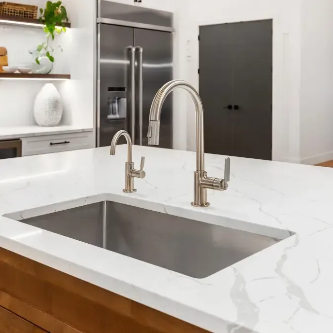 Undermount kitchen sink installation in Oakville by licensed plumber