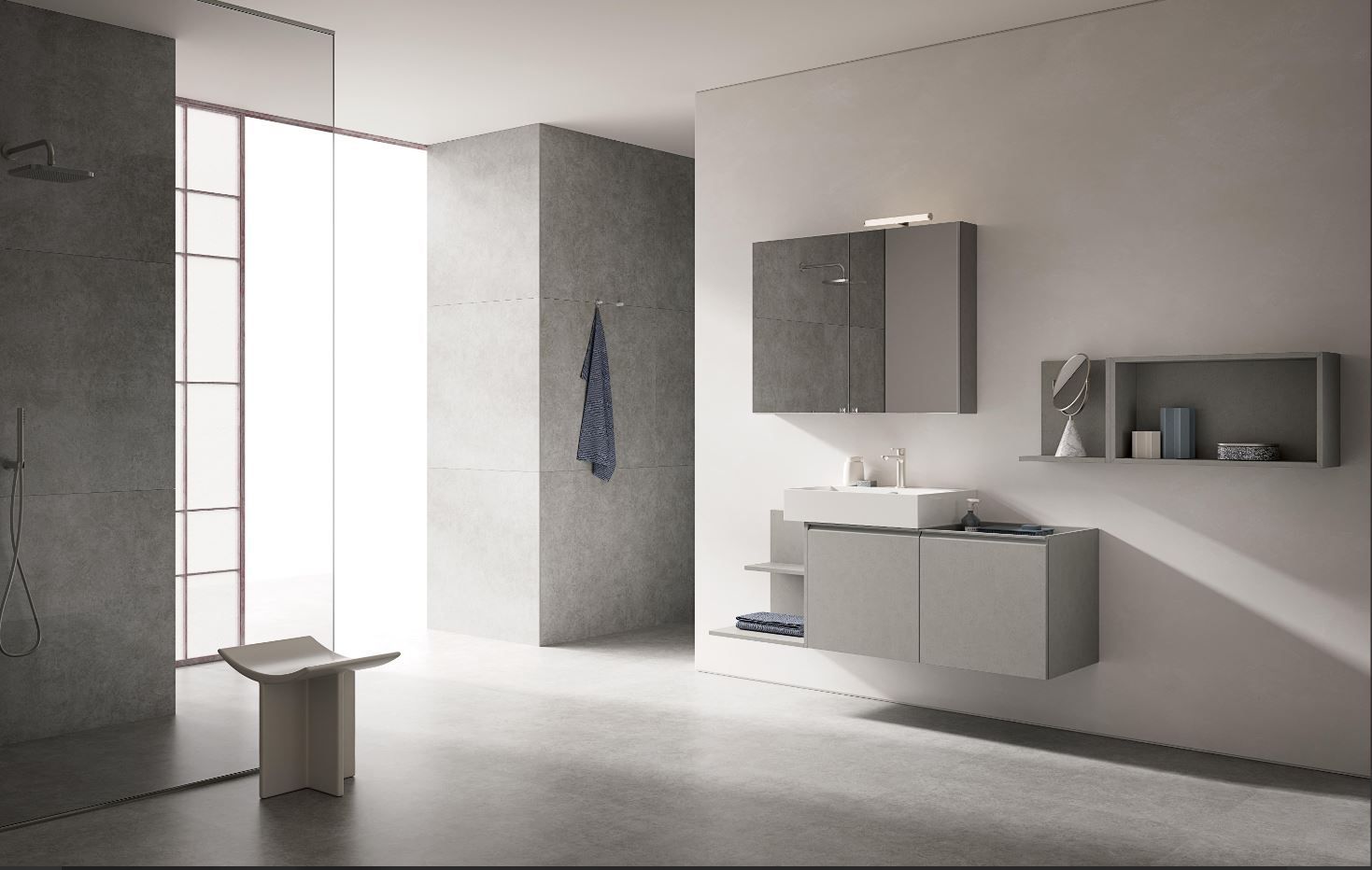 Un bagno con lavandino e specchio