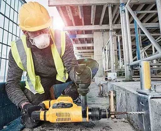 construction worker with drill