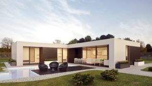 Modern white and brown home with large windows, patio with black chairs, and green yard.