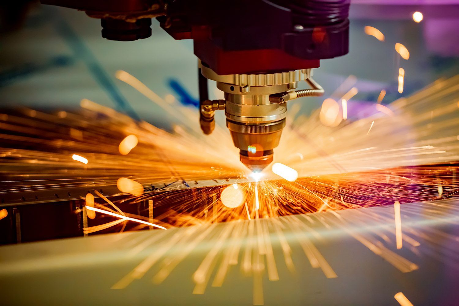 A Machine Cutting the Steel