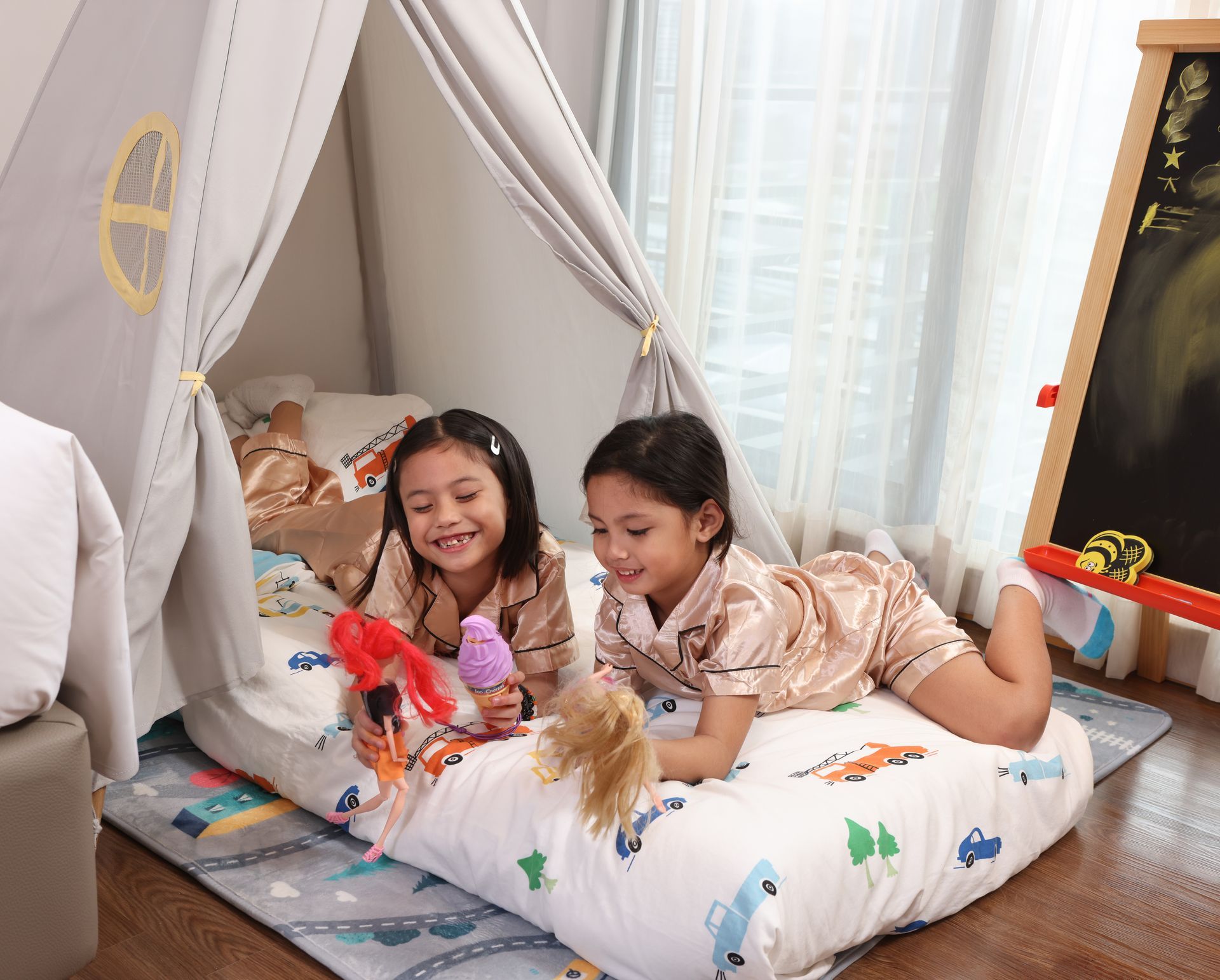 Kids playing in teepee at one of our rooms