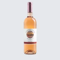 Bottle of rosé wine with a white label and dark cap on a light background