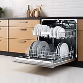Dishwasher with open door, loaded with white dishes, in a wooden kitchen.