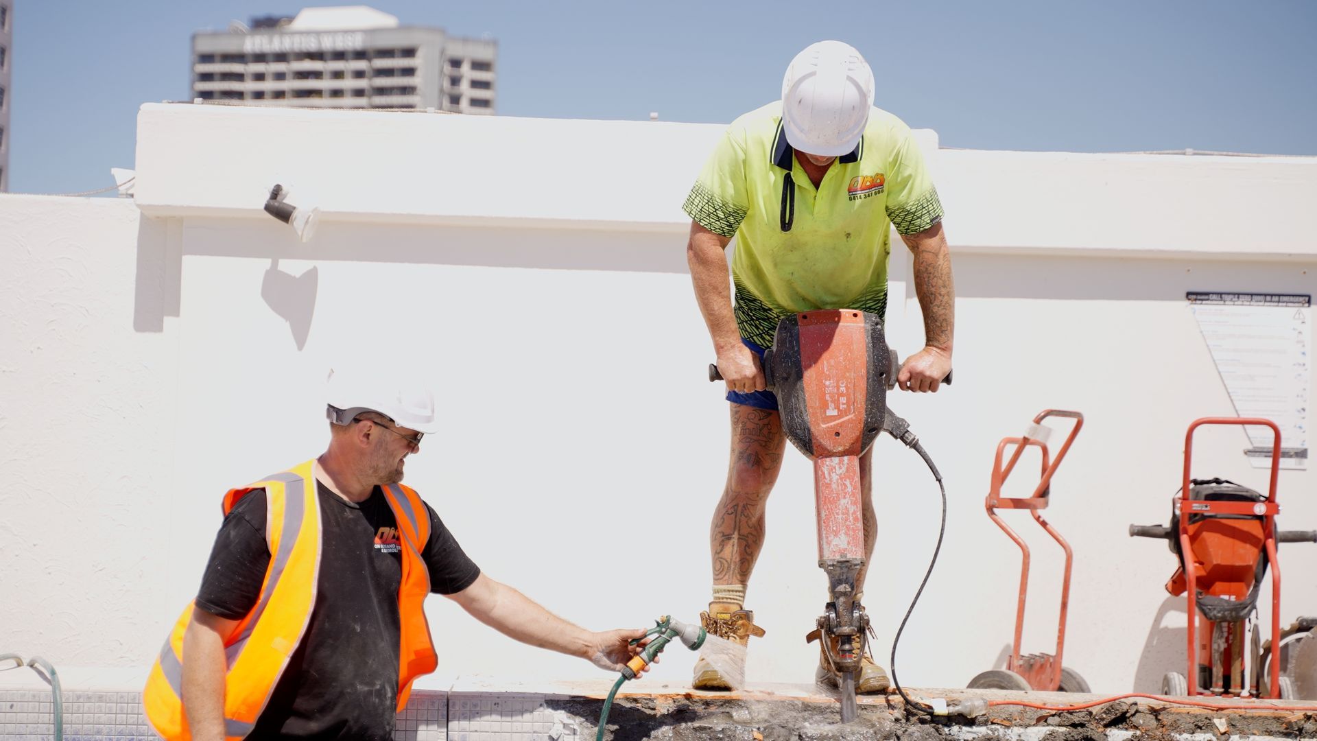 A Wheelbarrow Rocks Next to a Swimming Pool Under Construction — On Demand Diggers & Demolitions in Molendinar, QLD