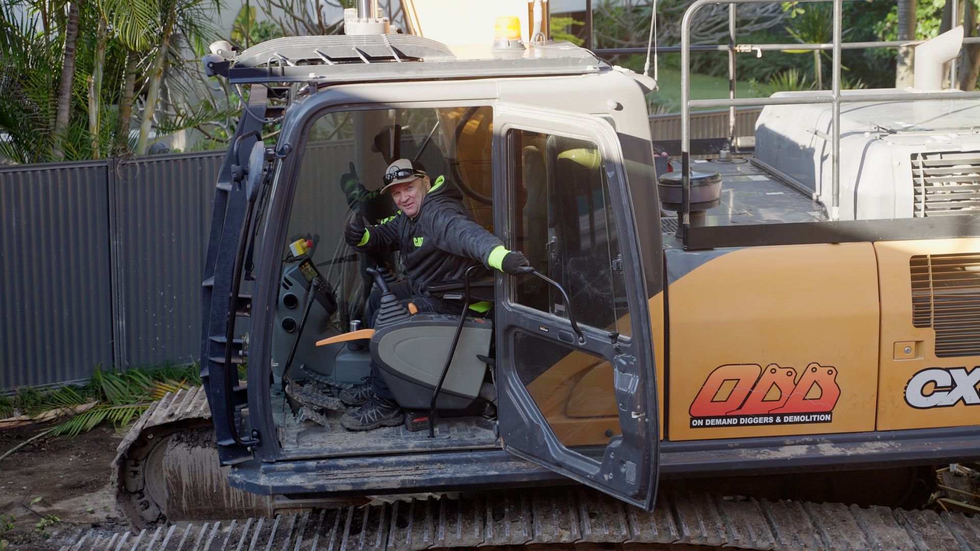 Bulldozer is Digging a Hole in the Ground at a Construction Site — On Demand Diggers & Demolitions in Molendinar, QLD