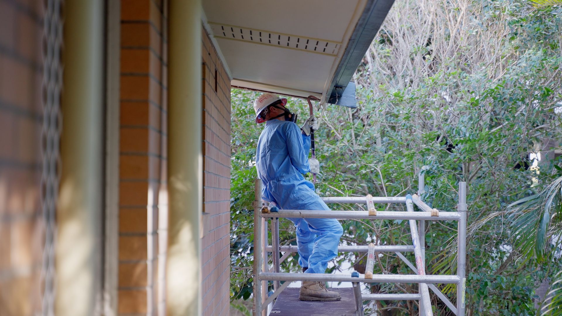 Couple of People Are Working on a Roof — On Demand Diggers & Demolitions in Sunshine Coast, QLD
