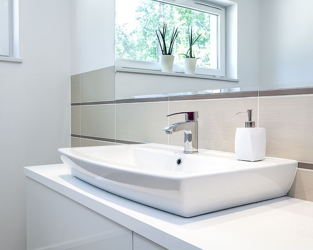 Replaced New Modern Faucet and Sink
