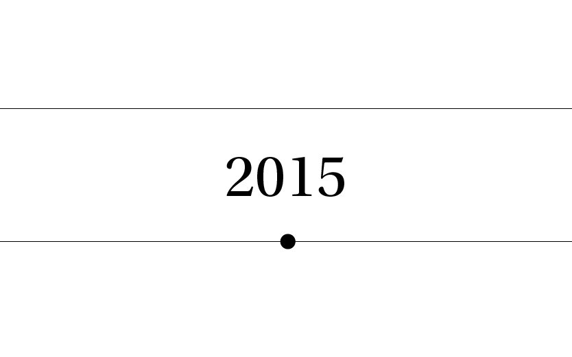Una pancarta en blanco y negro con el año 2015.
