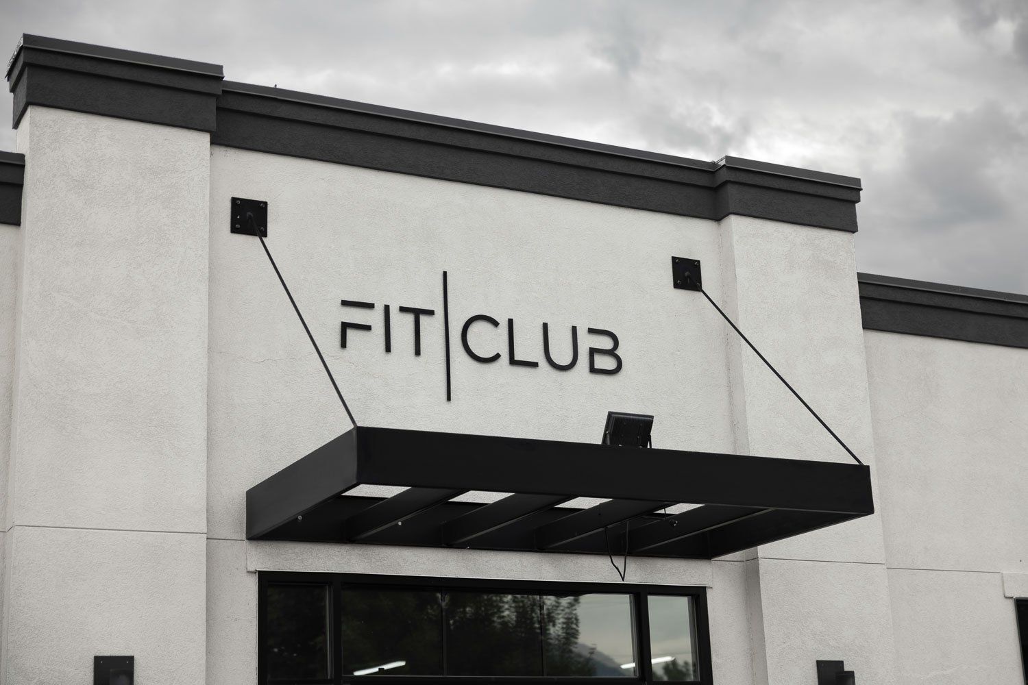 Entrance of FitClub, a fitness center in Salem, Utah offering personal training and open gym access.