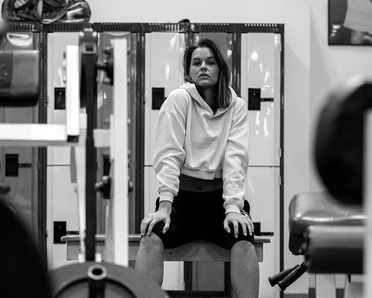 FitClub member in Salem, Utah, resting after a personalized training session.