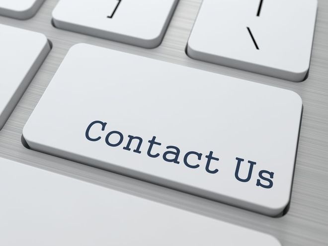 “Contact Us” key on a white keyboard, close-up
