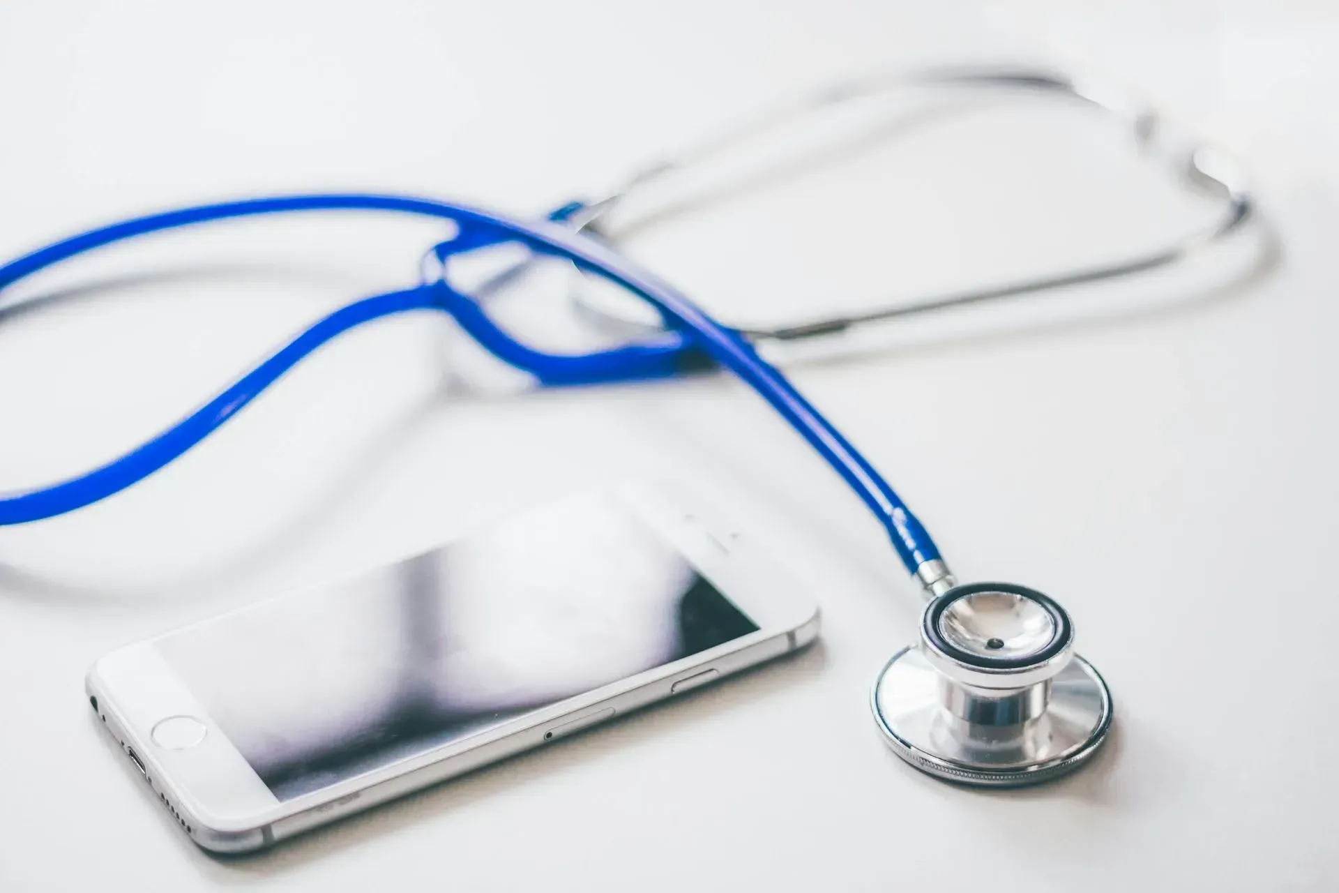 Stethoscope and smartphone representing integrative medicine services in Montrose CA